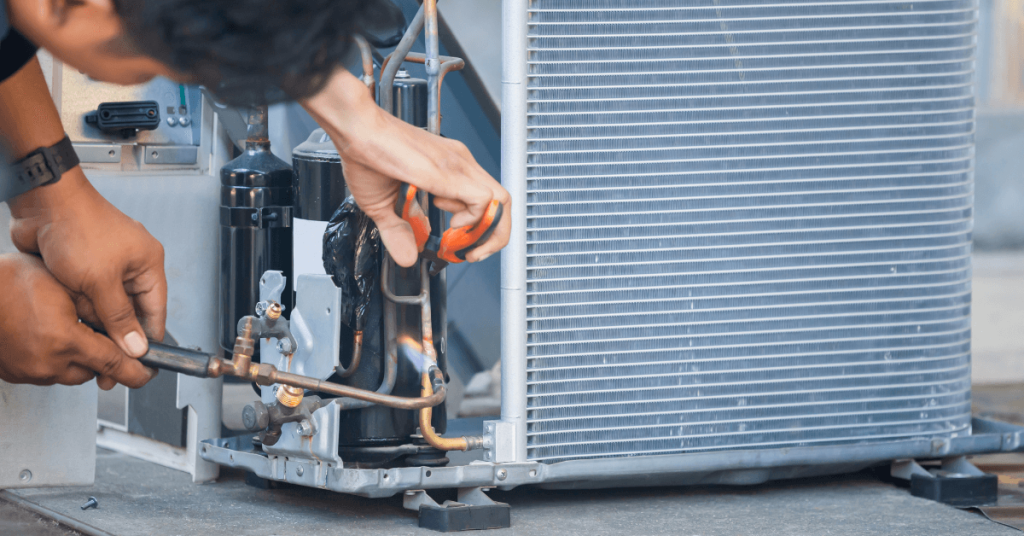 Commercial HVAC system service tech